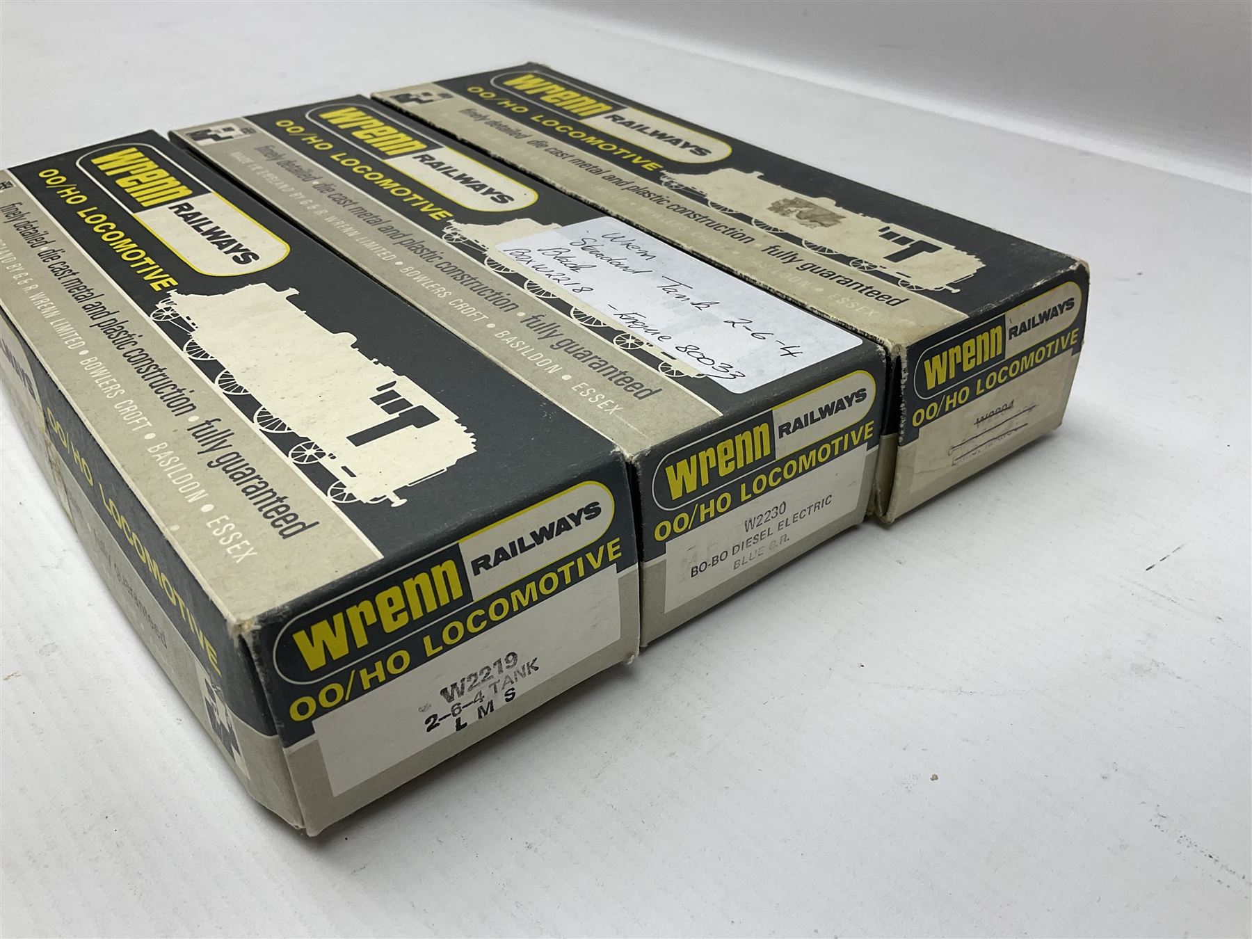 Wrenn '00' gauge - three 4MT Standard 2-6-4 tank locomotives - No.2679 LMS Lined Maroon; boxed with instructions; No.8230 in GWR Green; and No.80033 in BR Lined Black; both in associated Wrenn boxes (3)