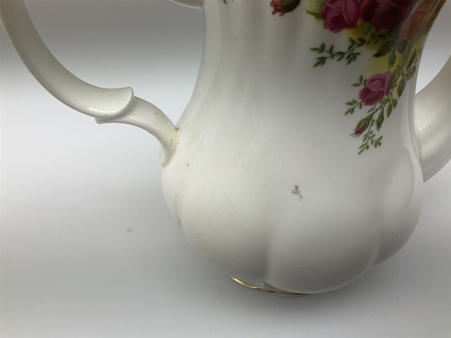 Royal Albert Old Country Roses pattern tea set, comprising teapot, coffee pot, six teacups and six saucers, five side plates, further teacup with joined saucer and side plate, open sucrier, milk jug, cake plate, and preserve pot and cover, together with Royal Albert Jubilee Rose pattern sauce boat and stand, and Royal Albert Lavender Rose pattern cake stand. 