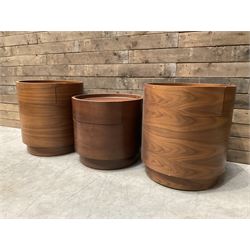 Three walnut circular barrel shaped lamp tables, fitted with single drawer (lower table D53cm, H49cm)