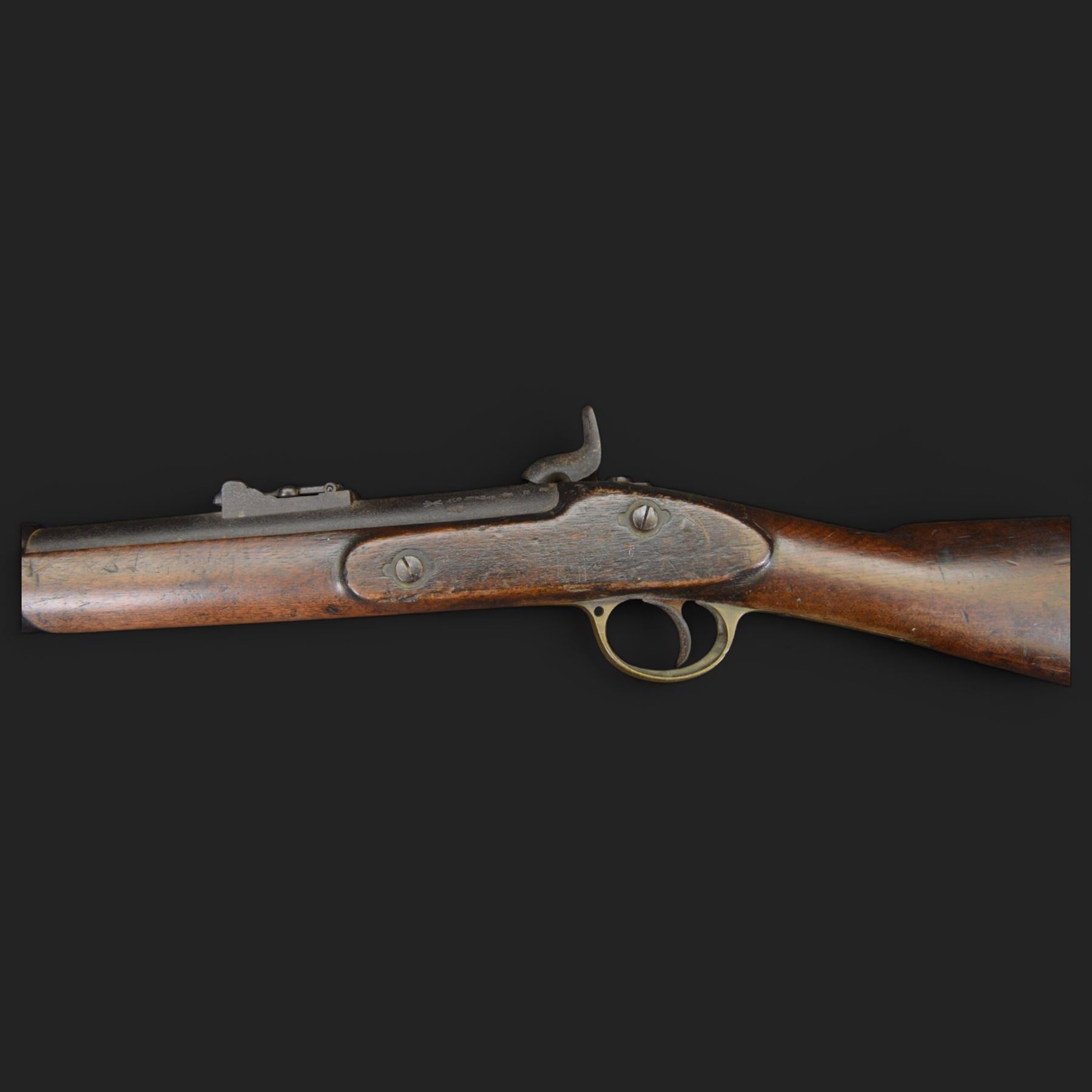 Two-Band short service musket, the L66cm barrel with sold out of service marks and indistinct marks, with ram rod beneath, the lock marked with crowned and Windsor 1855, overall L108cm
Sold as an exempt item under Section 58 (2) of the 1968 Firearms Act, to be held as a curiosity or ornament
