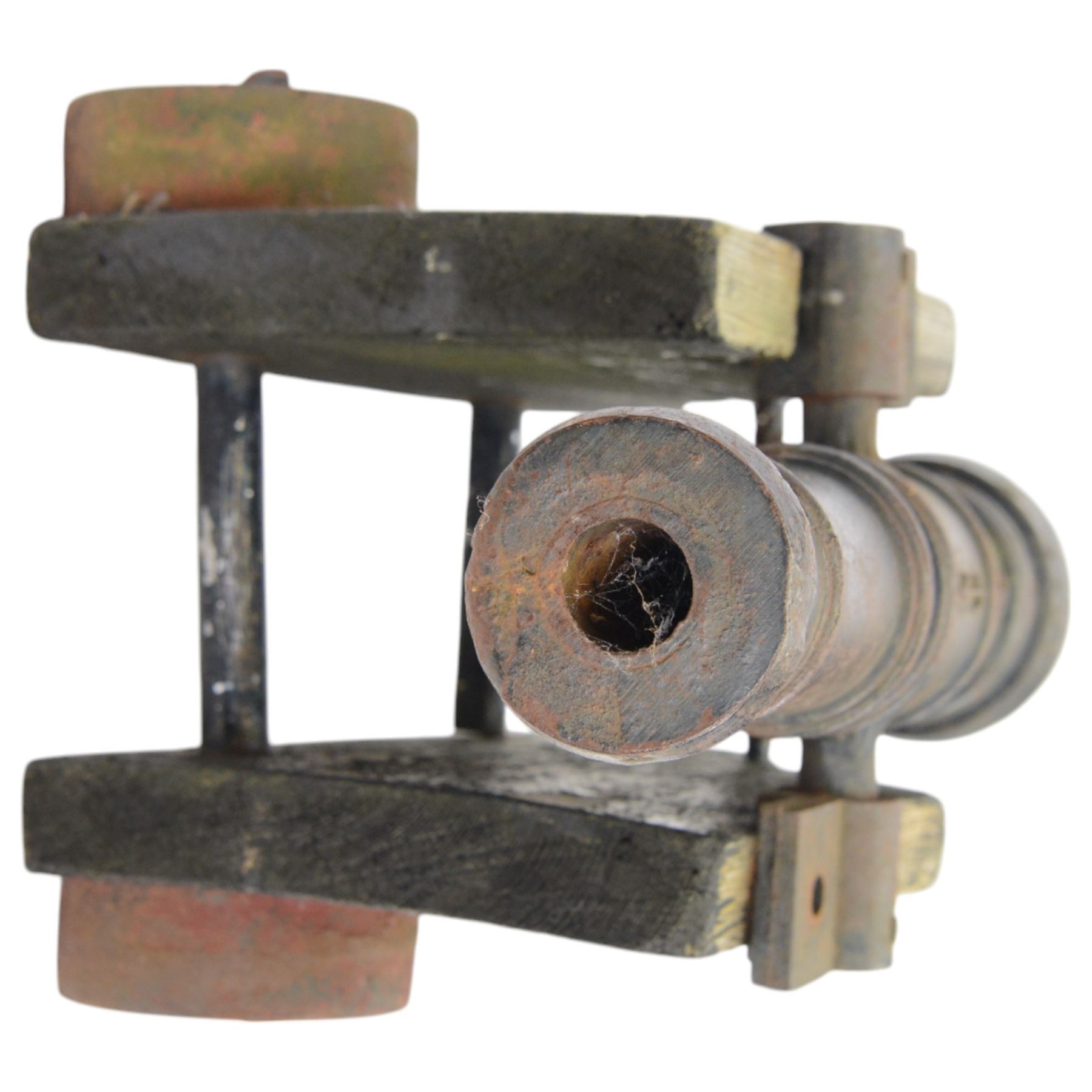 Victorian model of a ship's cannon, the ringed iron barrel with flared muzzle upon an
wooden carriage with four iron wheels, L54cm