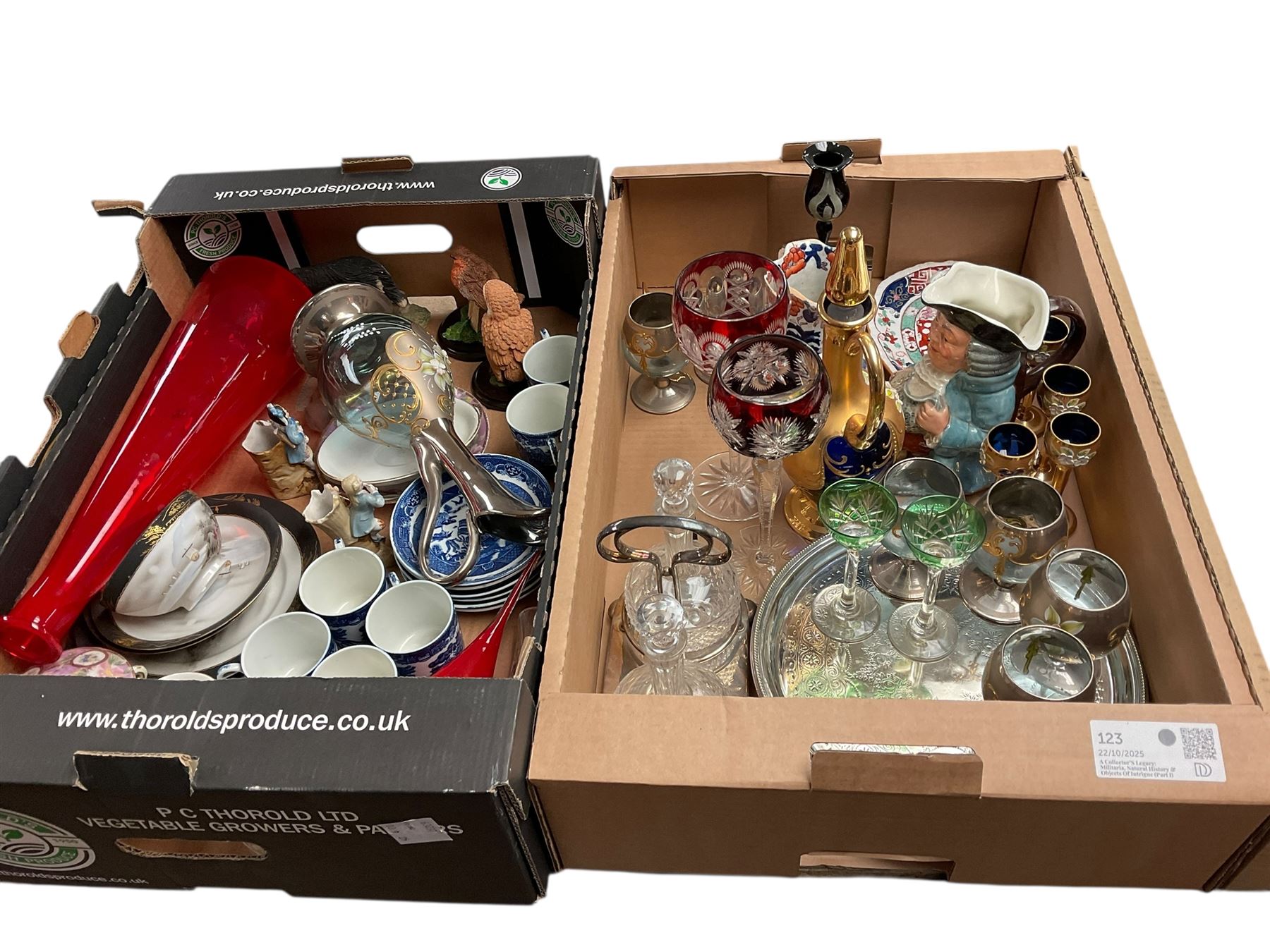 Two Coalport trios, decorated with birds and flowers, together with coloured glass decanters and other collectables, in five boxes 