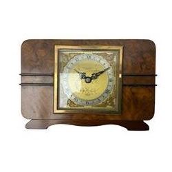Elliot - 8-day1950’s Walnut veneered mantle clock ,with a timepiece movement and balance wheel escapement, square brass dial, silvered chapter ring, cast spandrels, and louis XV style hands within a glazed brass bezel, dial inscribed 