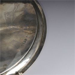 Victorian silver tray, of circular form with beaded rim, engraved to the centre with floral decoration, upon three scroll mounted paw feet, hallmarked Walter & John Barnard, London 1877, D30.5cm