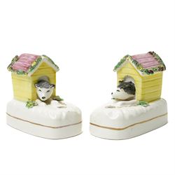 Pair of late 19th century Staffordshire pen holders, modelled as dogs in kennels, W9.5cm
