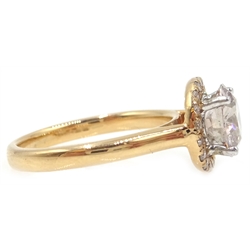  18ct rose gold diamond halo ring, stamped 750, central diamond approx 1.3 carat  