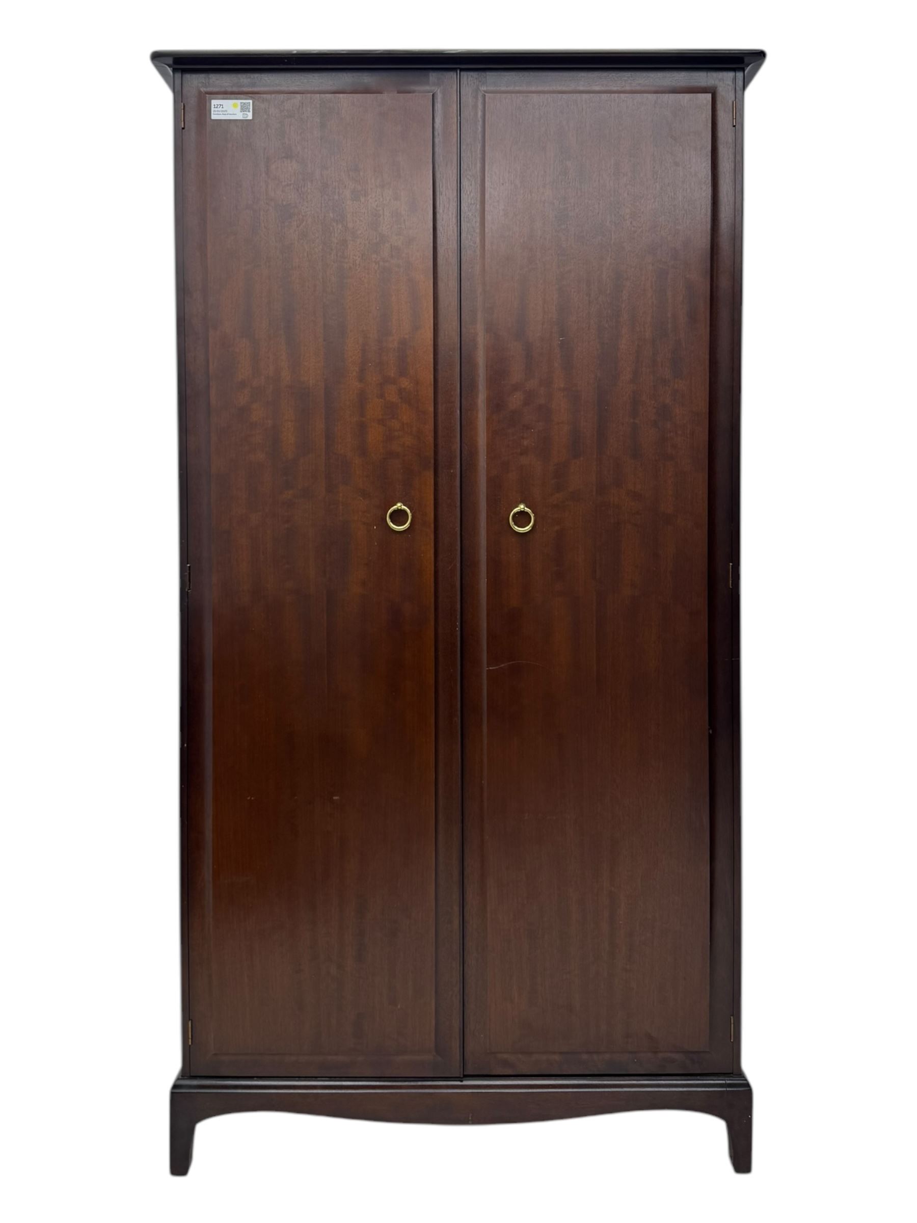 Stag Minstrel - pair of mahogany double wardrobes, comprising a larger wardrobe with a shelf and hanging rail behind two panelled doors (W127cm, D59cm, H177cm); and a smaller wardrobe enclosing a single hanging rail (W96cm, D59cm, H177cm), both finished with projecting cornices and raised on bracket feet



