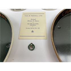 Pair of Royal Doulton Toby Ale Jugs, produced in 1934 for Charrington Ales, together with two circular metal serving trays advertising Charrington brewery, a Charrington badge awarded for 25 years of service and a 1949 menu Fox & Nicholl Ltd annual dinner dance at the toby jug hotel.  