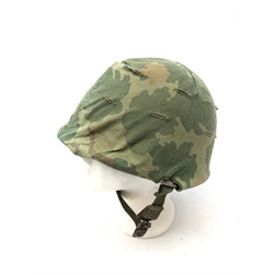  American steel helmet, composite liner with adjustable webbing and chinstrap. Vietman camouflage cover, L28cm  