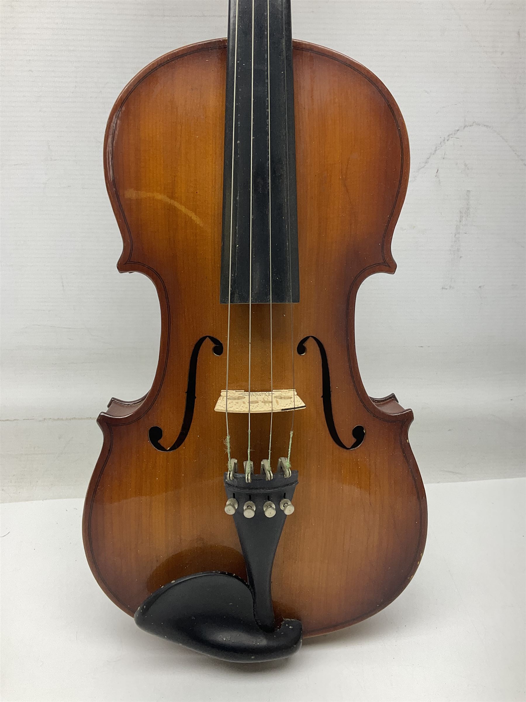 Chinese Parrot violin with 35.5cm two-piece back; L59.5cm in carrying case; and early 20th century German violin for restoration; bears label 'Antonius Stradivarius Faciebat Anno 1730'; cased with bow (2)