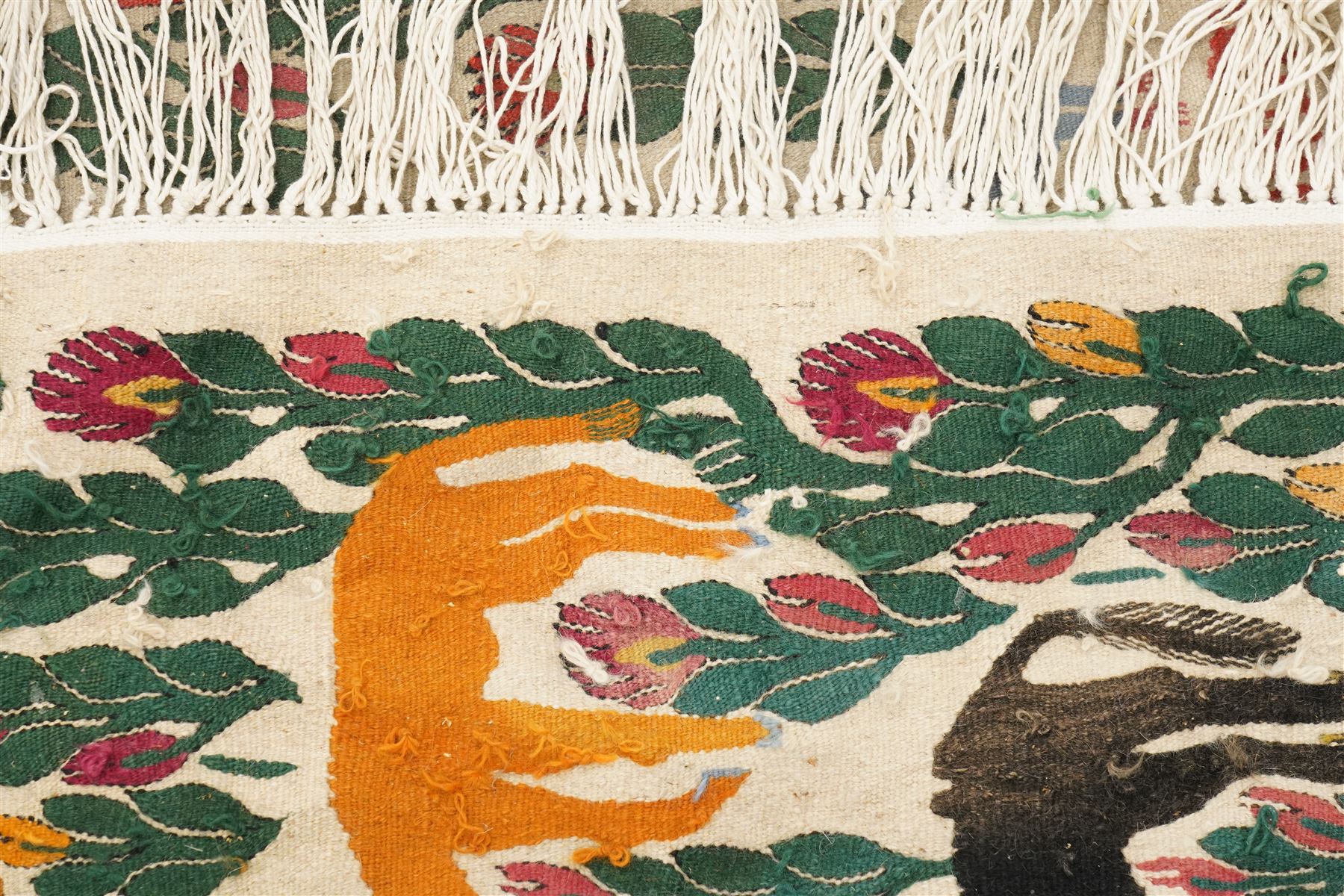 Anatolian pictorial folk art wall hanging or rug, depicting several mountain goats, flamingo and flowers, signed indistinctly 