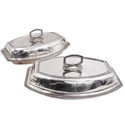 Pair of 1930s silver serving dishes with covers, each with removable handles, hallmarked Barker Brothers Silver Ltd, Birmingham 1935, L27.5cm, H12cm