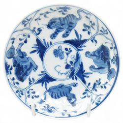 Set of six Chinese blue and white saucers, mostly Kangxi period, comprising matching pair decorated with insects and birds, example with painted lions and tigers, four bearing blue painted 'lingzhi' fungus mark to base, the others unmarked (6)