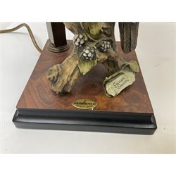 Two Giuseppe Armani figural lamps, the first modelled as an owl perched upon a book, the second modelled as a pair of owls perched upon blackberry branch, each with damask fabric tassel shades, tallest H76cm