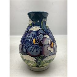 Moorcroft vase decorated in Christmas Pansy pattern, designed by Rachel Bishop, with printed and painted marks beneath, in original box,  H14cm