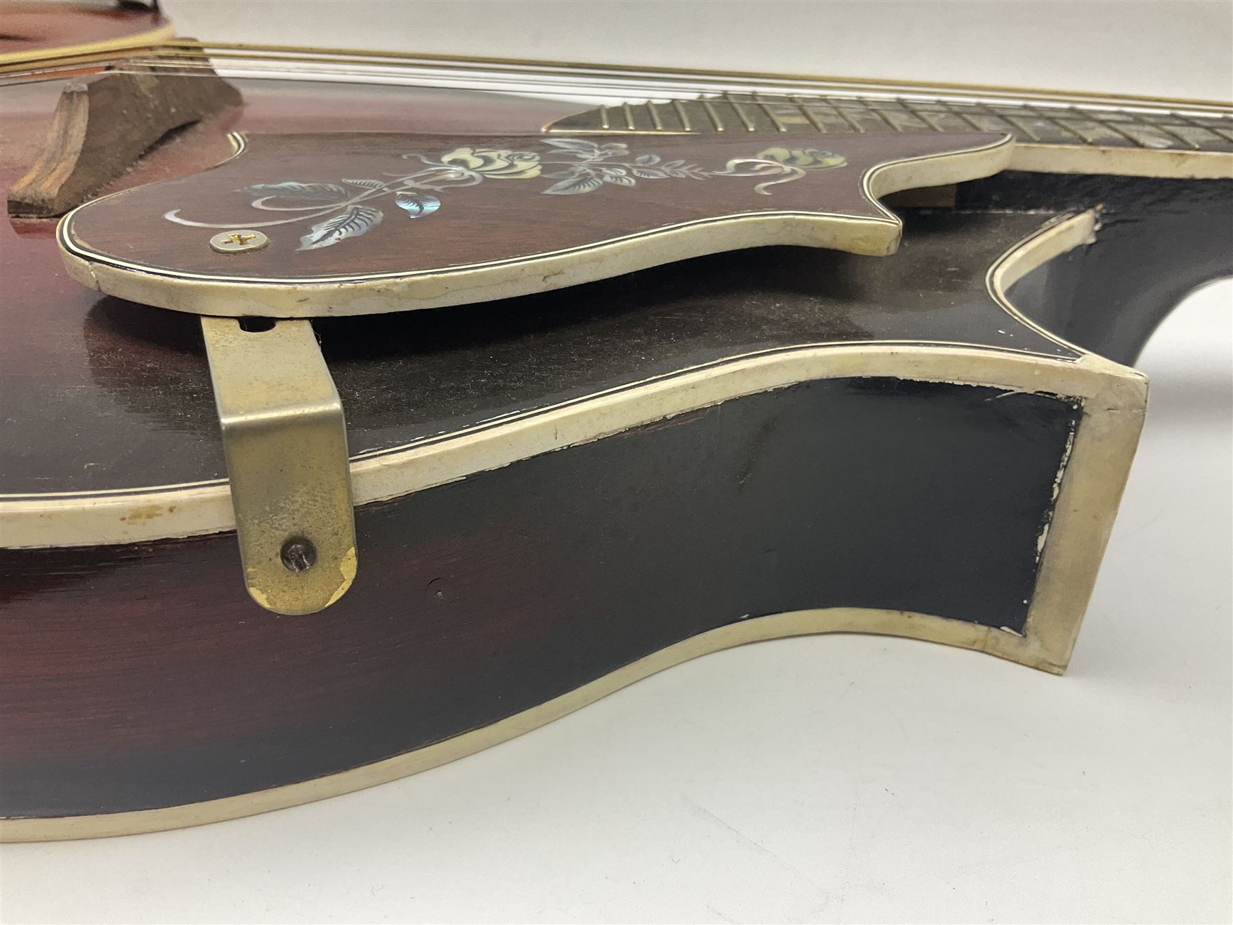 Eastern eight-string mandolin with sunburst finish and mother-of-pearl inlay L68.5cm; and another Harmony mandolin with cracked headstock (2)