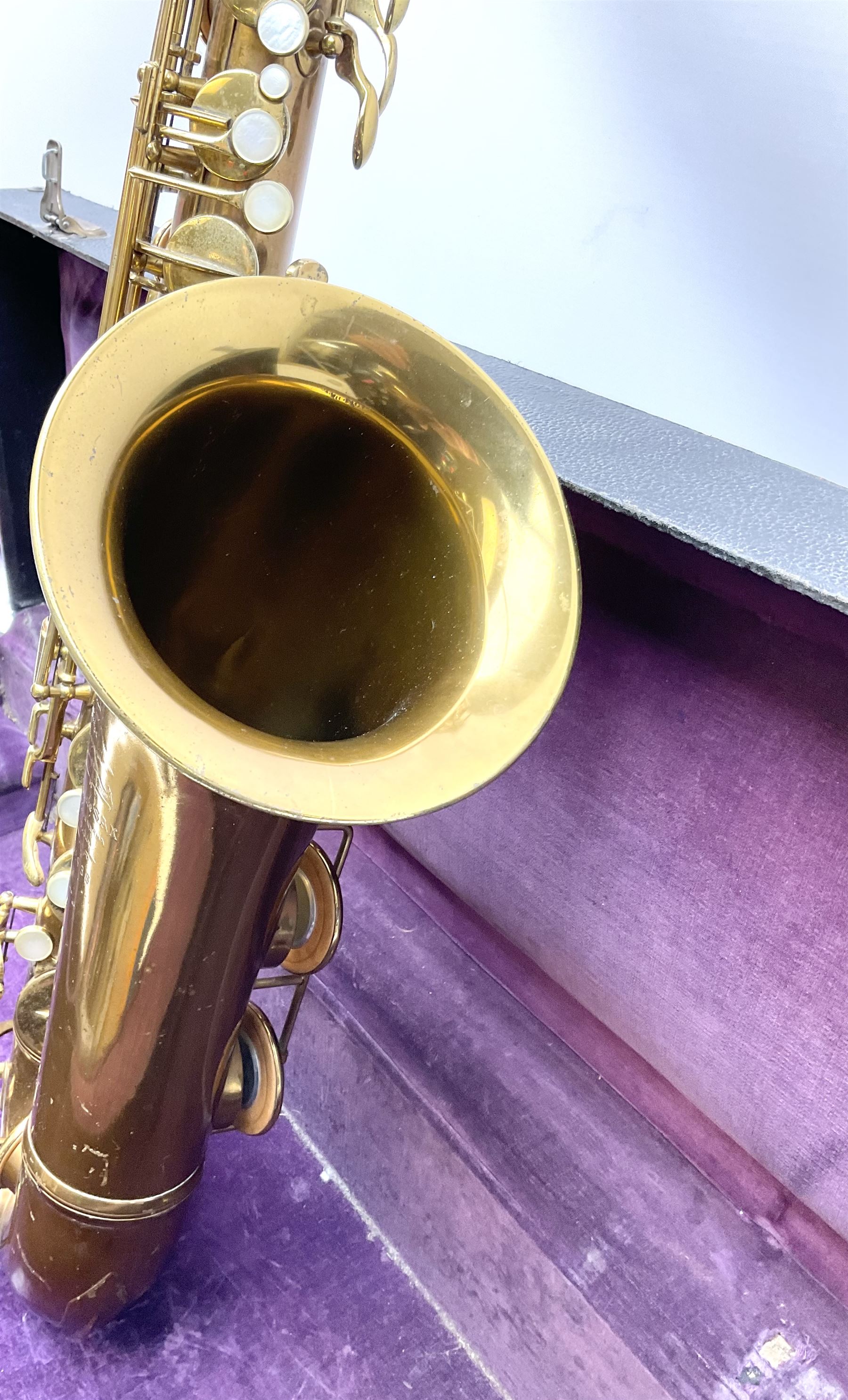Brass tenor saxophone by Adolphe SAX, 84 Rue Myrha, Paris,  No.938 serial number 12097, H75cm excluding crook; in hard carrying case bearing plaque for Henri Selmer