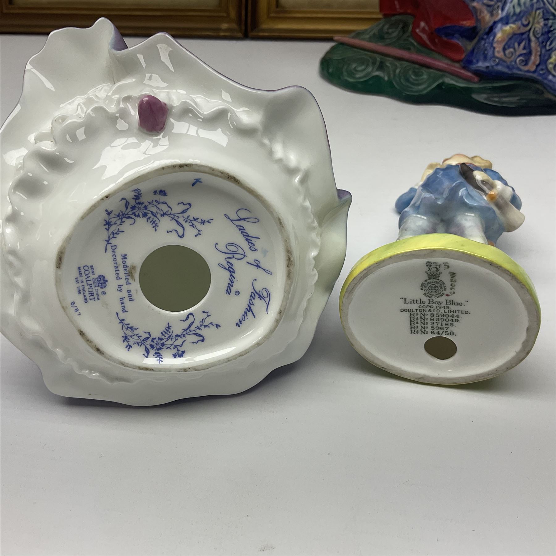 Four Royal Doulton figures, to include The Broken Lance HN 2041, The Old Balloon Seller HN 1315, The Balloon Man HN 11954 and Little Boy Blue HN 2043, together with a Coalport Ladies of Fashion figure Regina and three framed hunting silk needle works