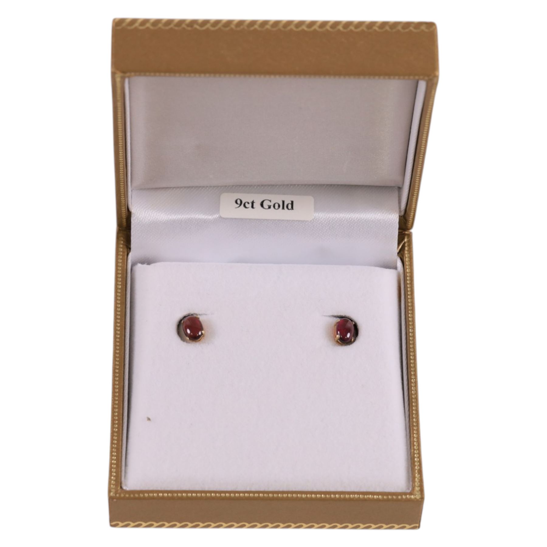 Pair of 9ct gold oval garnet stud earrings, boxed, H6mm