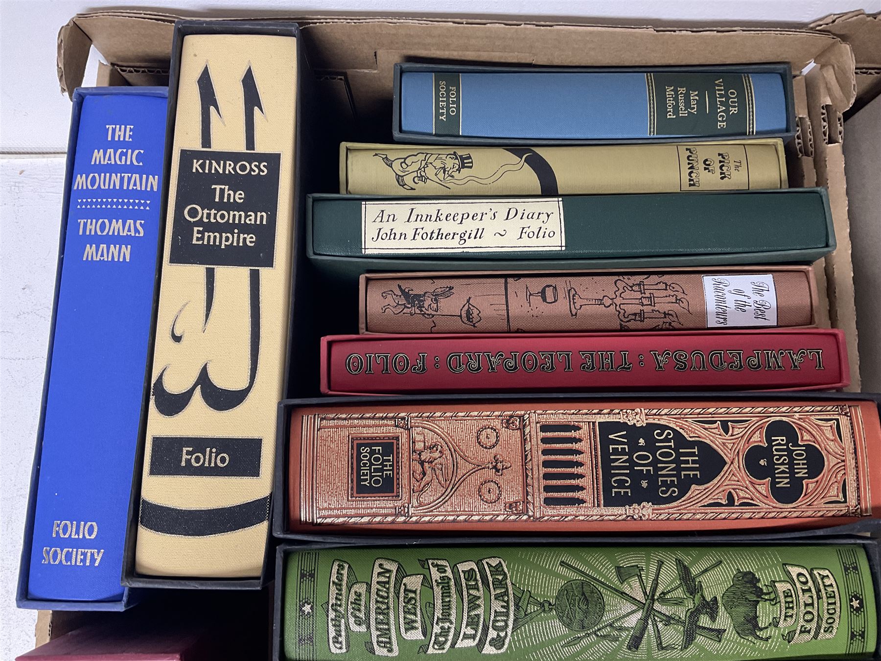 Folio Society; twenty eight volumes, including The Seven Year War, The Boer War, The Ottoman Empire, The Moons a Balloon, Captain Cooks Voyages etc 