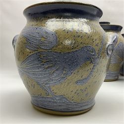 John Egerton (c1945-): set of five studio pottery stoneware twin handled jars with covers, decorated with blue birds upon a brown mottled ground, H20cm