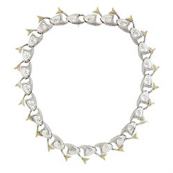 Brett Payne silver and 9ct gold fish necklace, twenty-five links each with silver fish hea...