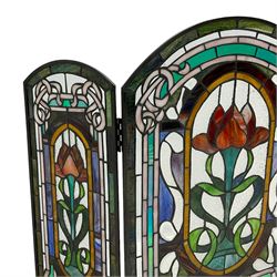 Art Nouveau design stained glass three panel fire screen, decorated with tulips and interlacing borders