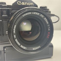 Canon A-1 camera body, serial no. 341014, with 'Canon FD 50mm 1:1.4 S.S.C.' lens, serial no. 12077119 and motor drive MA