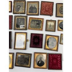 Collection of approximately twenty Victorian photographs, mostly daguerreotype, ambrotype and tintype portraits, largely contained within leather cases and frames with gilt mounts and red velvet lining 