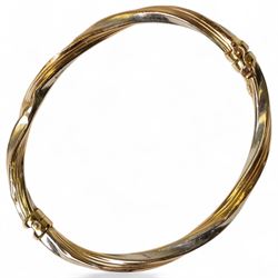 9ct white and yellow gold twist hinged bangle, stamped 375