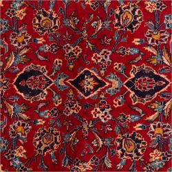 Two Persian rugs, the larger with a crimson field decorated with three linked indigo medallions amongst flowering tendrils, shaped floral spandrels and an indigo palmette border, (161cm x 129cm), the smaller with a crimson field centred by an ivory rosette amongst stylised flowering plants, within a dark floral border, (114cm x 79cm) (2)