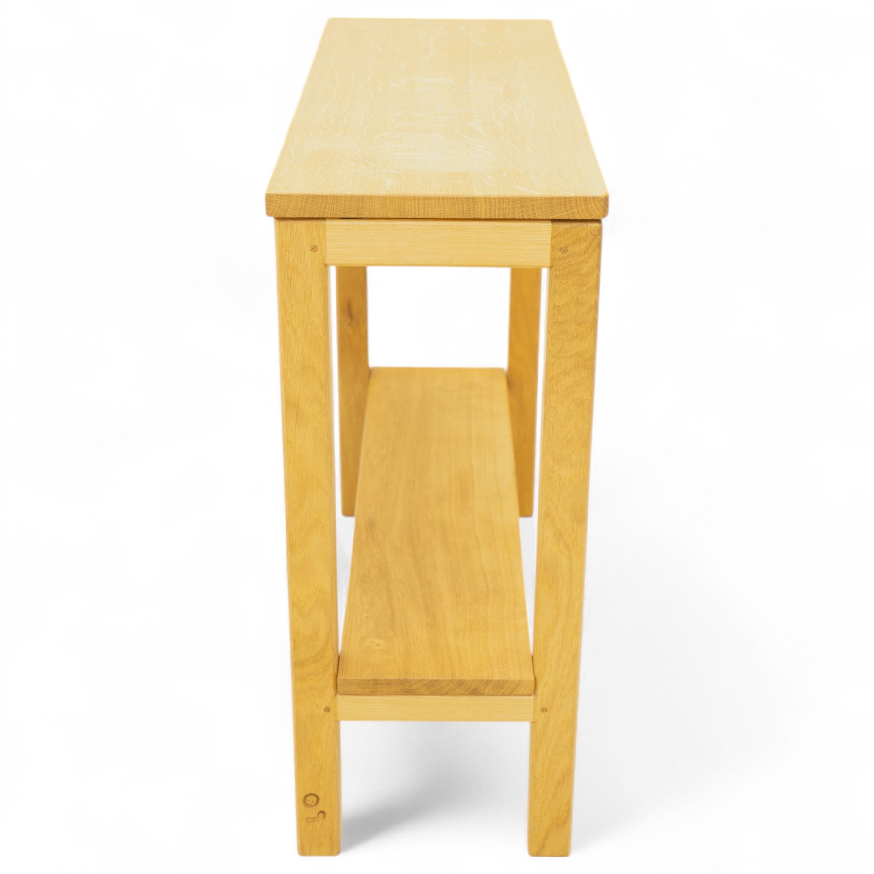 Woodwormman - oak console table, rectangular top over open frame with plain frieze, united by a low tier stretcher shelf, with carved Woodworm signature, by Nigel Dixon, Topcliffe, Thirsk