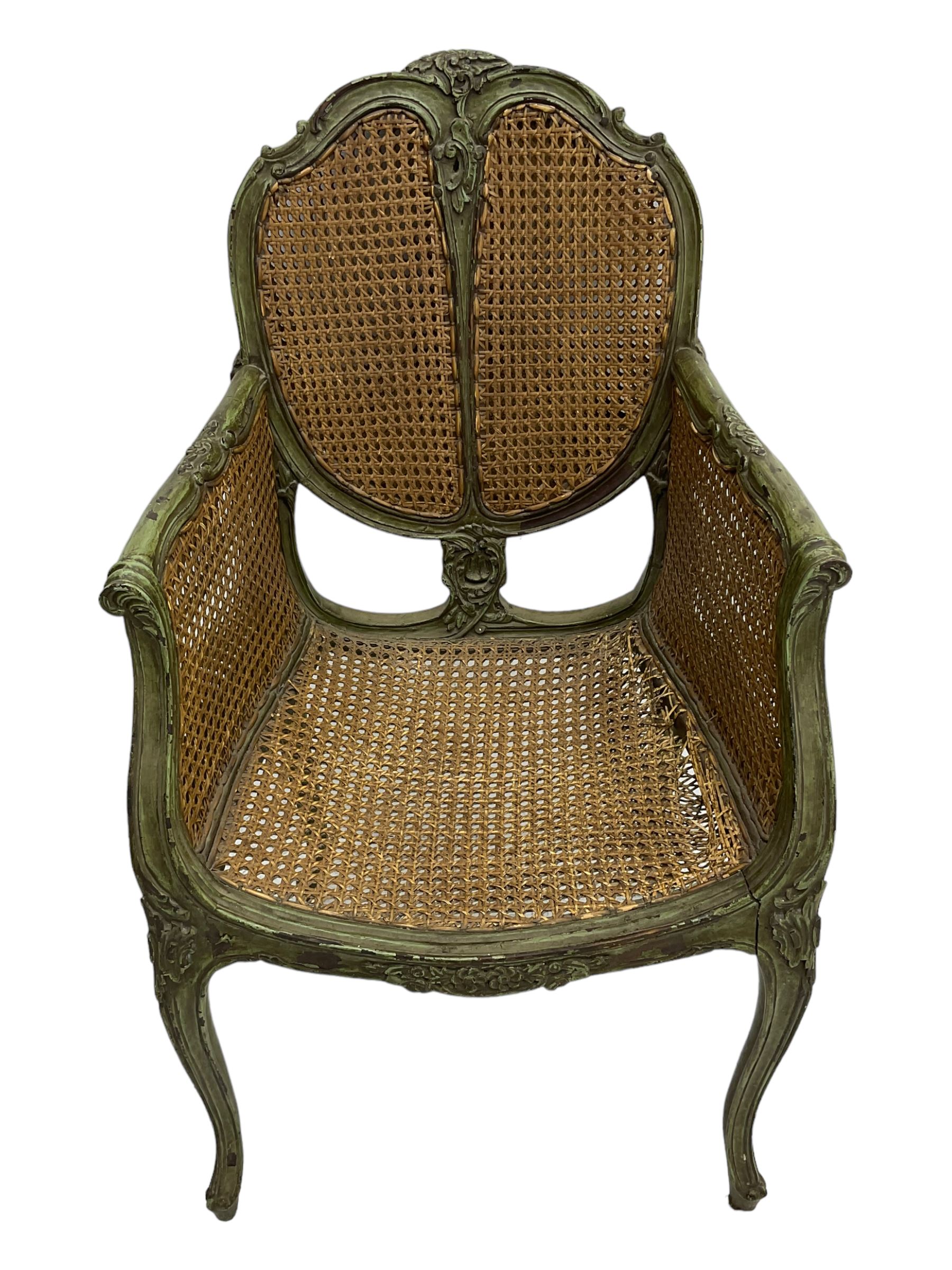 19th century French Louis XV-design armchair, carved and painted wood frame, caned back and seat with scrolled arms, supported by cabriole supports with acanthus leaf decoration