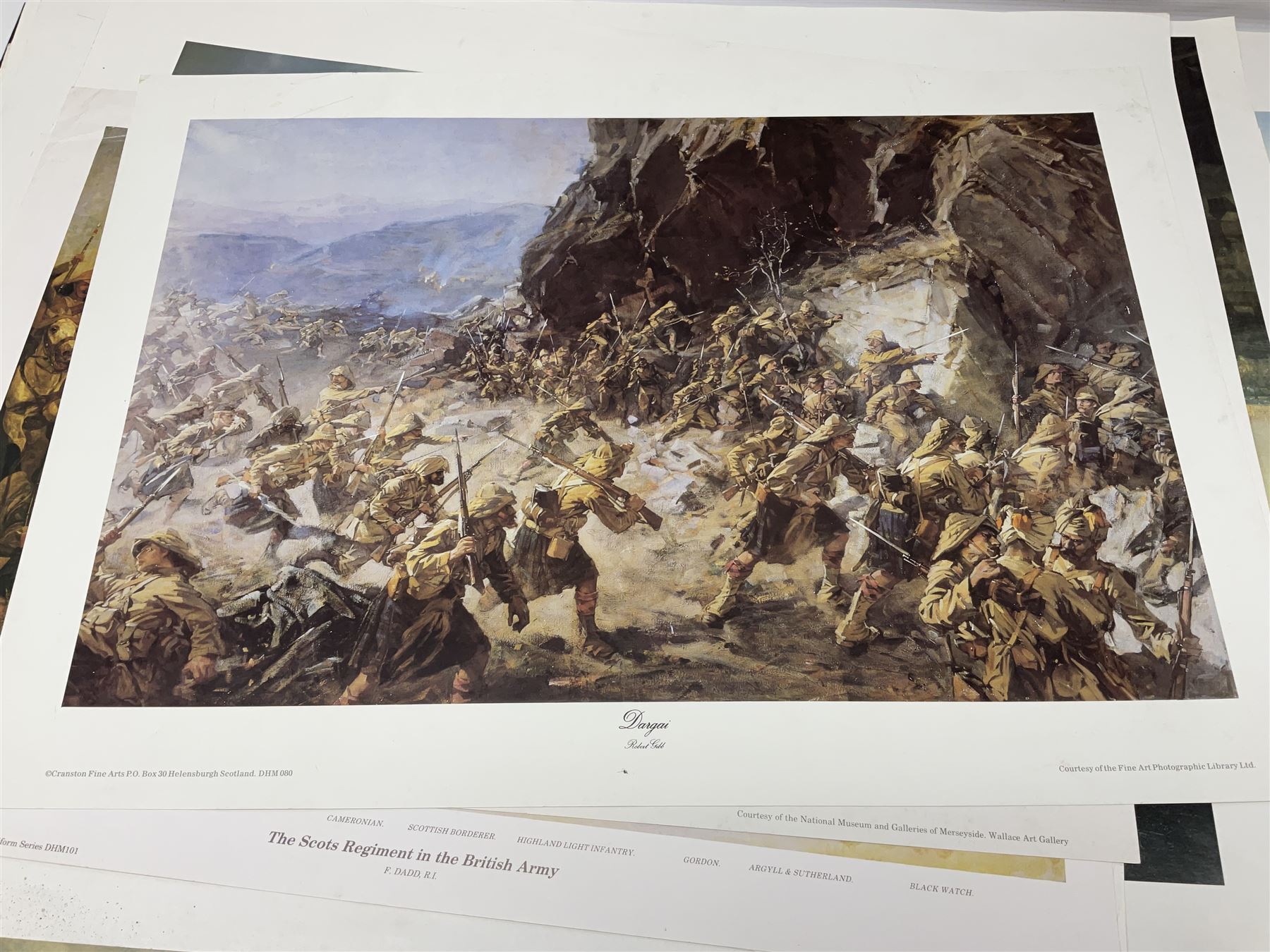 Large poster entitled 'Crests and Badges of the British Army in Daily Use 56 x 86cm; together with twenty-five colour prints of military interest including Crimean War, Boer War, WW2 etc; various sizes; all unframed