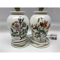 Two Portmeirion Botanic Garden table lamps, together with two Portmeirion Botanic Garden planters