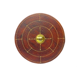  Replica Scottish Highlander's Targe by Joe Lindsay, based on an original 17th century targe which came from the Castle Grant, the wooden shield covered in tooled leather with traditional Celtic designs, brass studs and mounts with deer skin hide verso, D49cm   