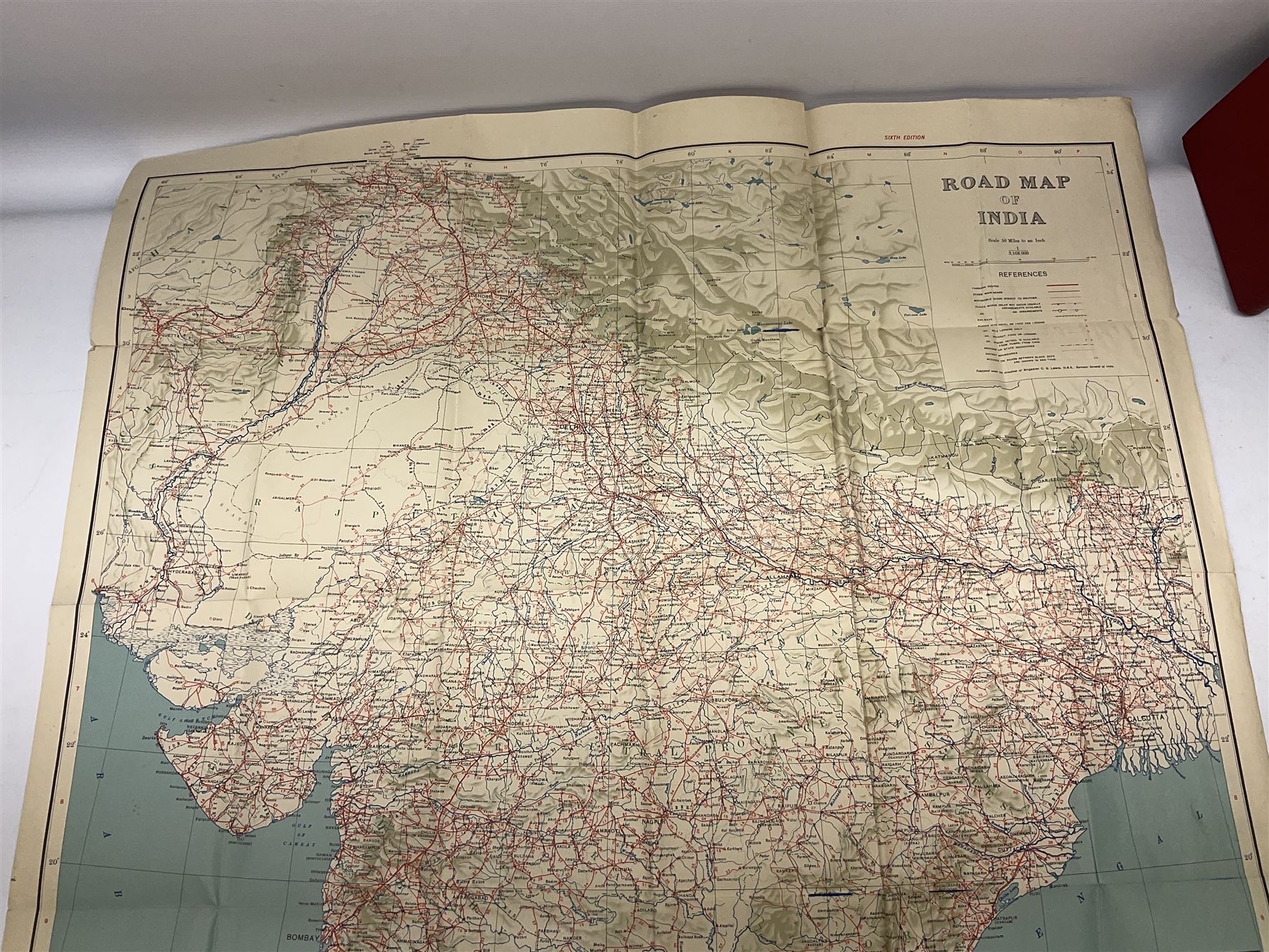 Military related books including two bound volumes of Phoenix Magazine Feb.1945 - Feb.1946; Knight W.S.M.: The History of the Great European War. Ten volumes; folding road map of India; The War in Pictures. Six volumes etc