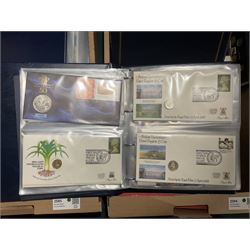 Approximately one hundred and fifteen Royal Mint coin covers, in two ring binder folders and loose, together with approximately 53 grams of Great British pre-1920 and approximately 68 grams of Great British pre-1947 silver threepence coins, and a small quantity of further pre-decimal coins