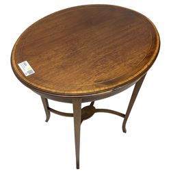 Edwardian inlaid mahogany centre table, oval moulded top with satinwood banding, on square tapering supports united by curved X-framed stretchers 