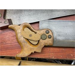 Large wooden tool box and carpenters tools, to include tenon and panel saws, box plane, mallet, chisels etc
