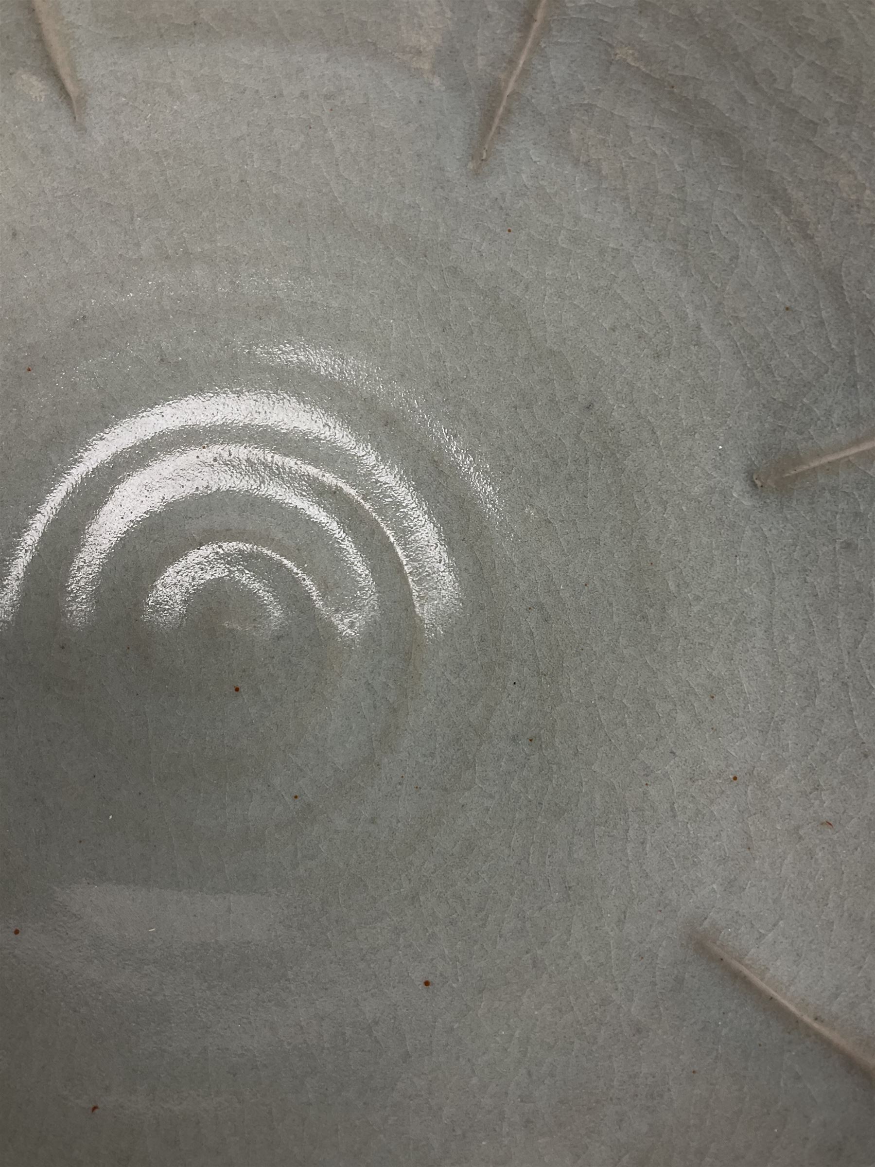 Jeremy Leach (British 1941-): Celadon glazed stoneware bowl of fluted circular form, with impressed mark beneath, D35cm
