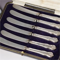 Set of six Australian silver coffee spoons each with a different terminal including Koala, Emu etc, Melbourne mint, cased and a set of six silver handles pastry knives, cased