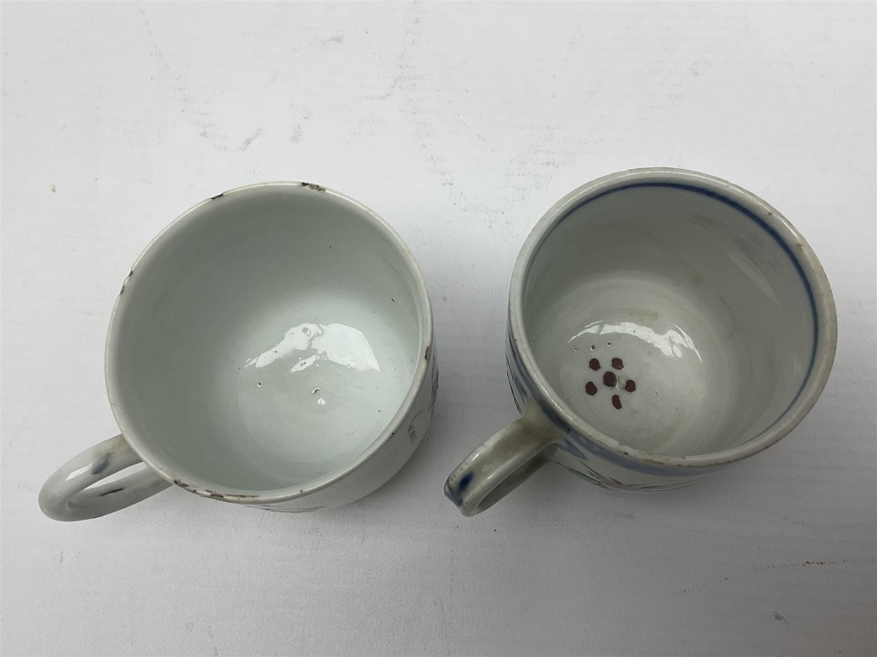 Two 18th century Chinese Yongzheng coffee cups, the first example decorated in polychrome enamel with rooster amidst blossoming peonies, the second decorated with deer and crane among rockwork and pine tree, together with two further 18th century Chinese coffee cups, an 18th century Chinese tea bowl, and a further tea bowl