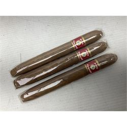 Two sealed packets of King Edward Invincible Deluxe Cigars and another three cigars 