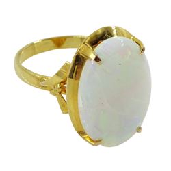 Gold single stone oval opal ring, stamped 14K 585