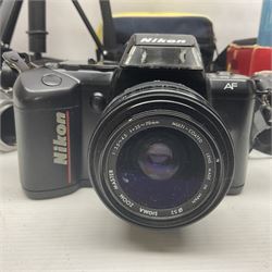 Collection of cameras, including Nikon F401 AF camera body, serial no 2111407, with Sigma Zoom Master 1:3.5-4.5 f=35-70mm lens, Fujifilm camera body etc 