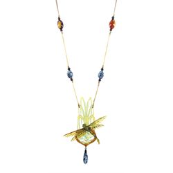 Elizabeth Bonté early 20th century carved horn dragonfly necklace, suspending a glass bead, on silk chord with glass and  resin bead spacers