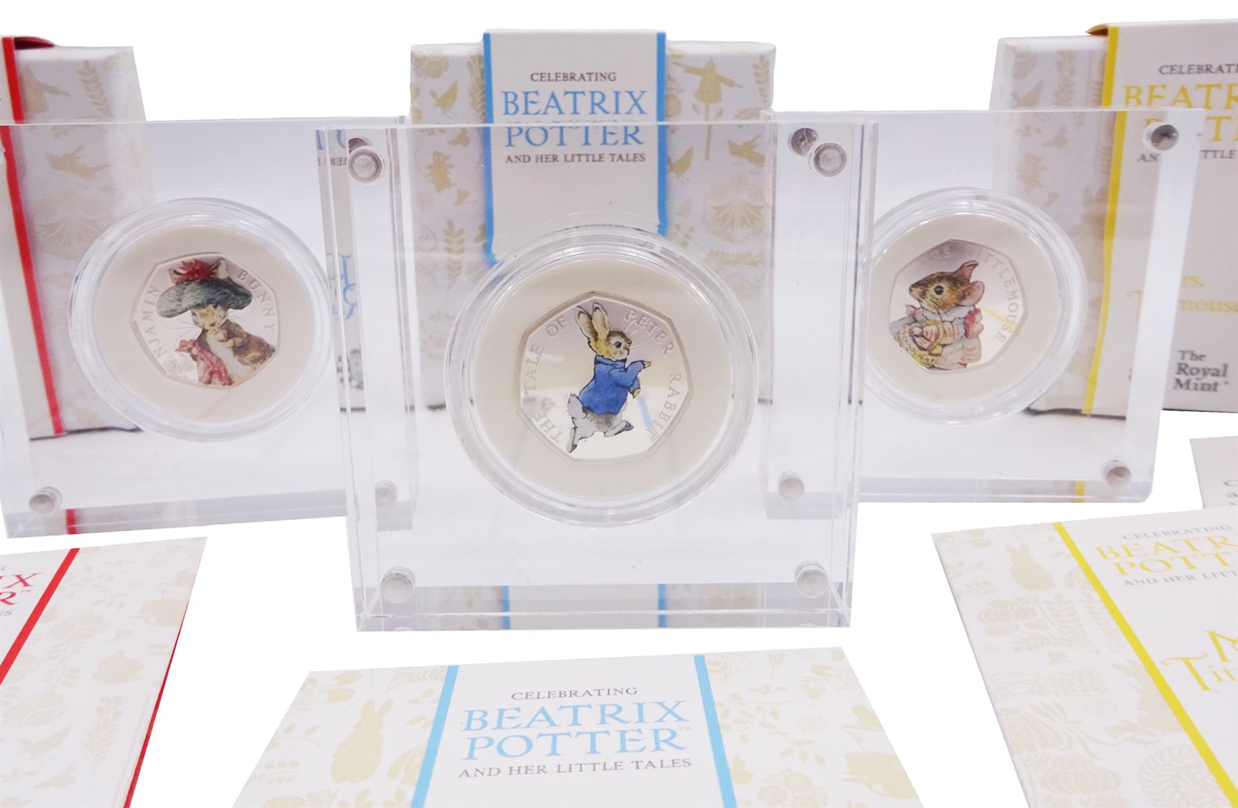 Three The Royal Mint United Kingdom Beatrix Potter silver proof fifty pence coins, 'Benjamin Bunny', 'Mrs Tittlemouse' and 'Peter Rabbit' all cased with certificates