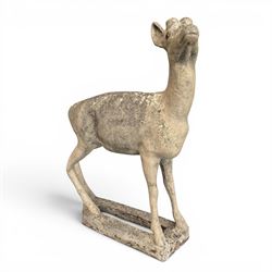 Pair of cast stone garden deer in a weathered finish with two loose antlers