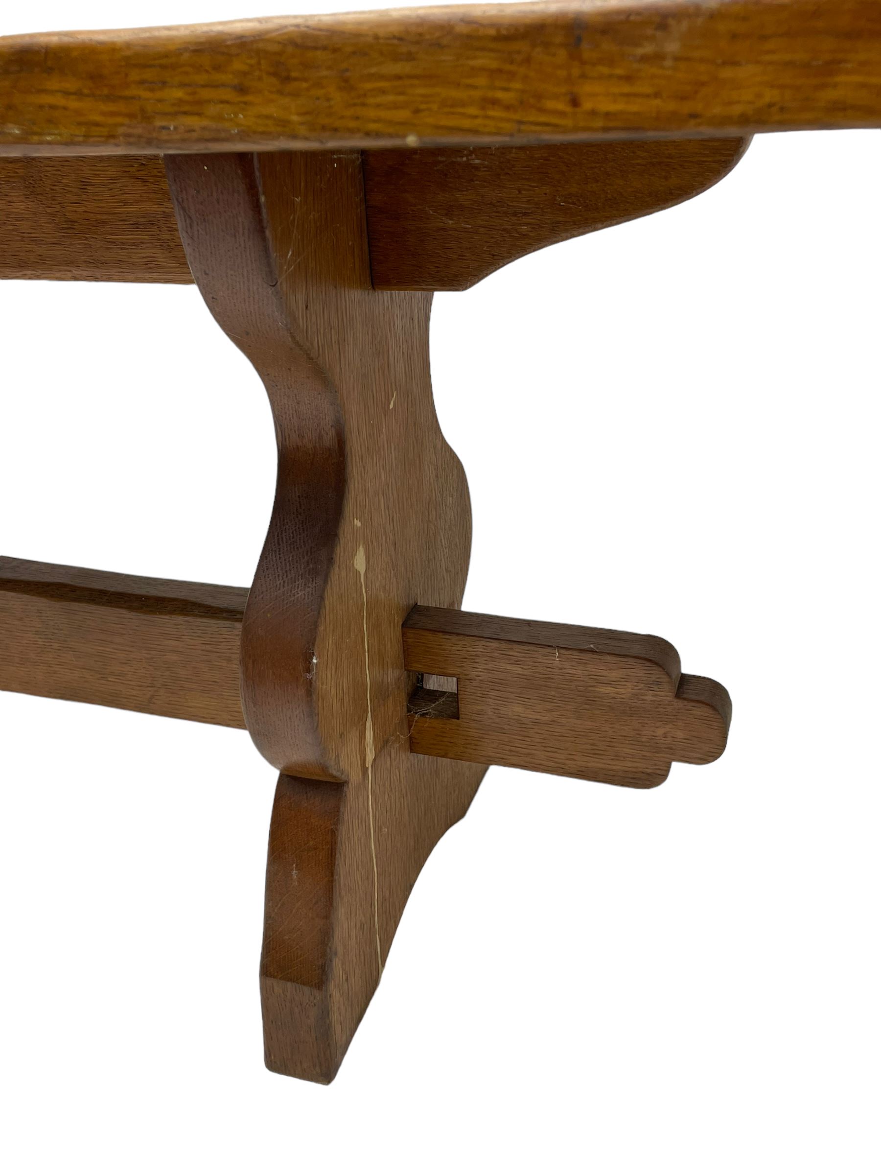 Gnomeman - adzed oak narrow bench, rectangular seat on shaped end supports united by pegged stretcher, carved with gnome signature, by Thomas Whittaker, Little Beck 